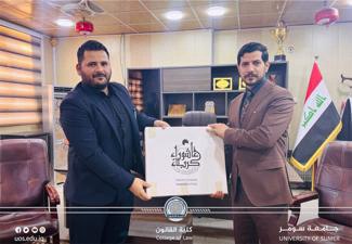 وفد العتبة المقدسة يزور كلية القانون بجامعة سومر ويُستقبل من قبل عميد الكلية
